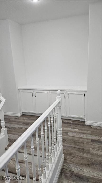 10337 Adams Chase St, Las Vegas, NV 89183 - hall featuring dark wood-style flooring and baseboards