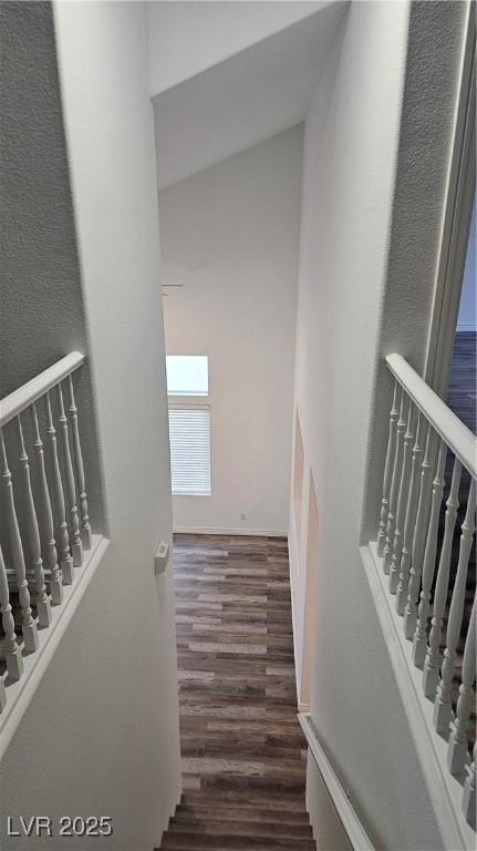 10337 Adams Chase St, Las Vegas, NV 89183 - staircase featuring wood finished floors