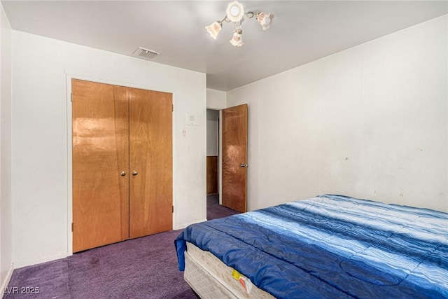 812 Pyramid Dr, Las Vegas, NV 89107 - carpeted bedroom featuring a chandelier and a closet