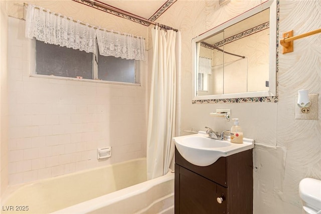 812 Pyramid Dr, Las Vegas, NV 89107 - bathroom featuring vanity, shower / bathtub combination with curtain, toilet, and wallpapered walls