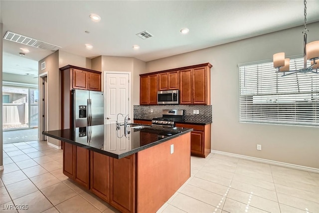 208 Coltrane Canyon Ave, Henderson, NV 89011 - kitchen with appliances with stainless steel finishes, light tile patterned floors, dark countertops, a sink, and recessed lighting
