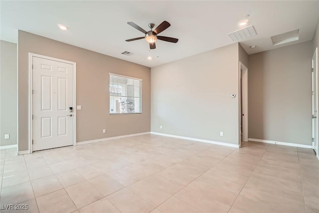 208 Coltrane Canyon Ave, Henderson, NV 89011 - unfurnished room featuring ceiling fan, light tile patterned floors, recessed lighting, baseboards, and attic access