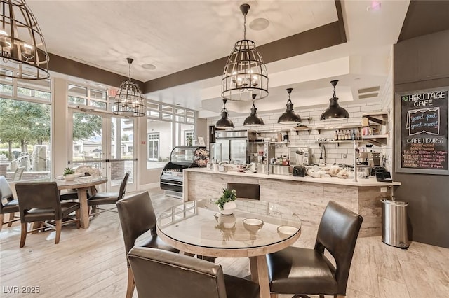 208 Coltrane Canyon Ave, Henderson, NV 89011 - dining area with a chandelier and wood finished floors