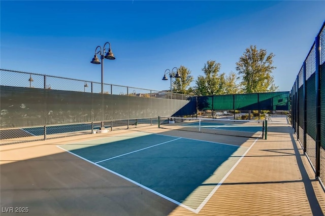 208 Coltrane Canyon Ave, Henderson, NV 89011 - view of tennis court featuring community basketball court