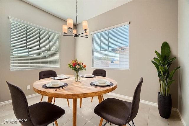 208 Coltrane Canyon Ave, Henderson, NV 89011 - dining area featuring a chandelier, plenty of natural light, and baseboards