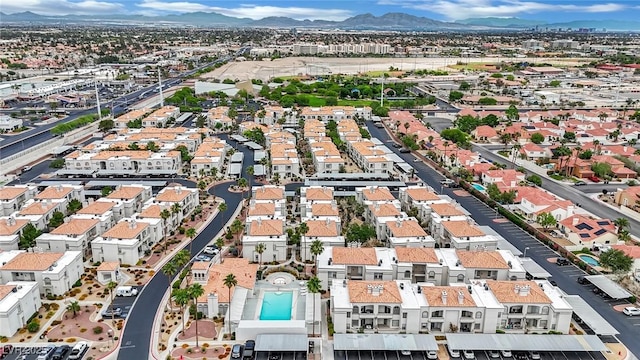 3150 Soft Breezes Dr Unit 1040, Las Vegas, NV 89128 - aerial view of property and surrounding area featuring a mountainous background and nearby suburban area