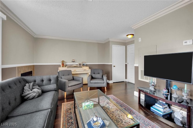3150 Soft Breezes Dr Unit 1040, Las Vegas, NV 89128 - living area featuring dark wood-style floors, a textured ceiling, and crown molding