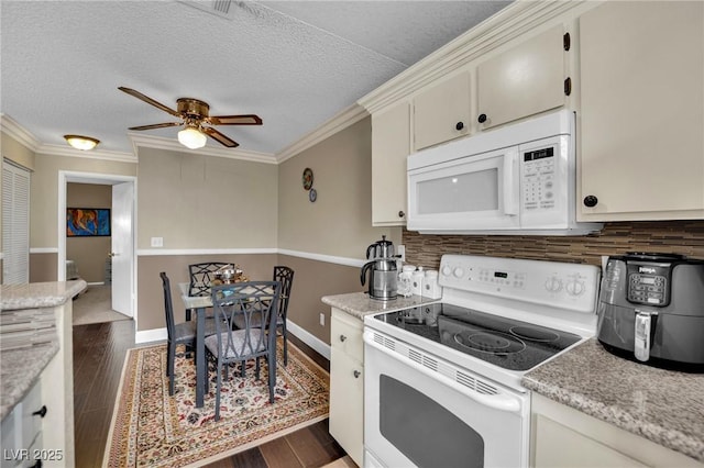 3150 Soft Breezes Dr Unit 1040, Las Vegas, NV 89128 - kitchen featuring white appliances, dark wood-type flooring, backsplash, a ceiling fan, and ornamental molding
