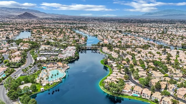 3150 Soft Breezes Dr Unit 1040, Las Vegas, NV 89128 - aerial perspective of suburban area with a water and mountain view