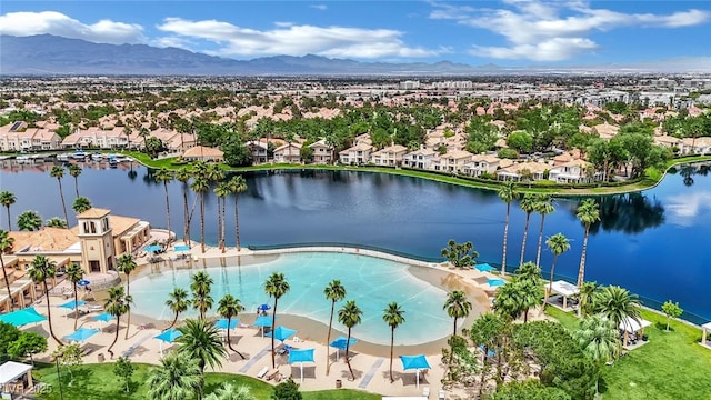 3150 Soft Breezes Dr Unit 1040, Las Vegas, NV 89128 - aerial perspective of suburban area with a pool area and a water and mountain view