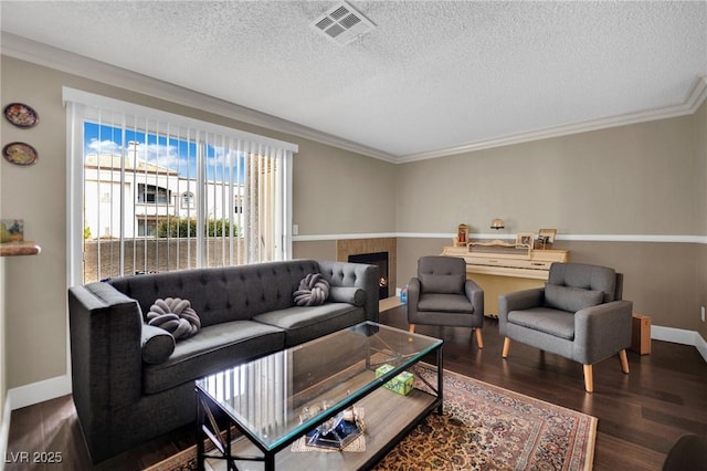 3150 Soft Breezes Dr Unit 1040, Las Vegas, NV 89128 - living area featuring baseboards, wood finished floors, a textured ceiling, and crown molding