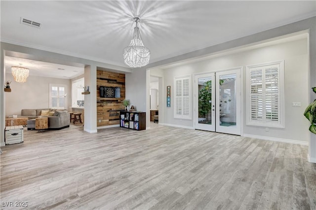 9349 Olympia Falls Ave, Las Vegas, NV 89149 - living area with a chandelier, wood finished floors, baseboards, and ornamental molding