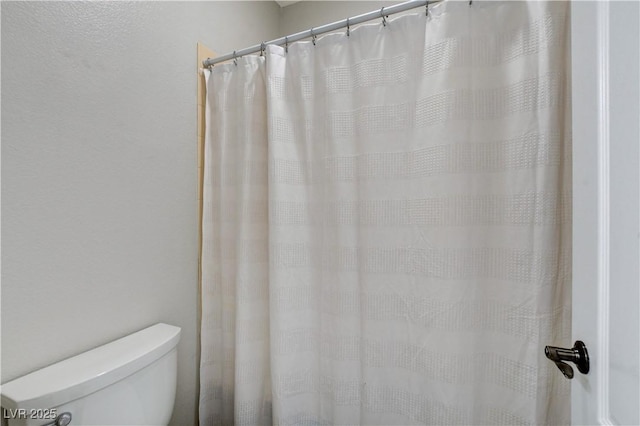 9349 Olympia Falls Ave, Las Vegas, NV 89149 - full bathroom featuring toilet and curtained shower