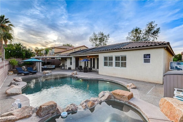 9349 Olympia Falls Ave, Las Vegas, NV 89149 - view of swimming pool with an in-ground hot tub, a patio, and an outdoor hangout area