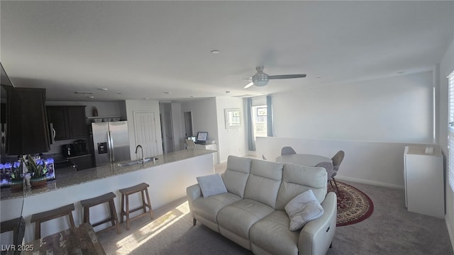 5209 Silica Chalk Ave, Las Vegas, NV 89115 - living area featuring ceiling fan and carpet floors
