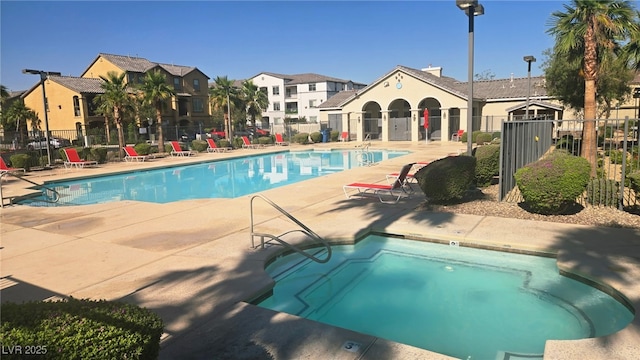 5209 Silica Chalk Ave, Las Vegas, NV 89115 - community pool featuring a patio area and a residential view