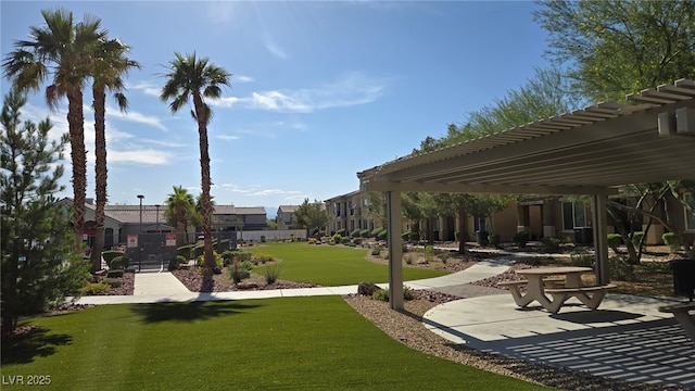 5209 Silica Chalk Ave, Las Vegas, NV 89115 - view of property's community with a yard, a residential view, and a patio area