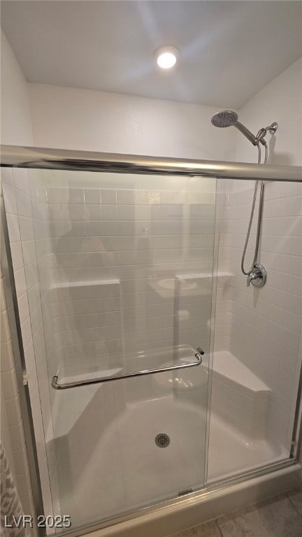5209 Silica Chalk Ave, Las Vegas, NV 89115 - full bathroom with a stall shower and tile patterned floors