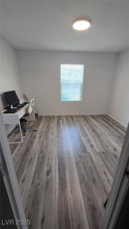 5209 Silica Chalk Ave, Las Vegas, NV 89115 - unfurnished office featuring wood finished floors