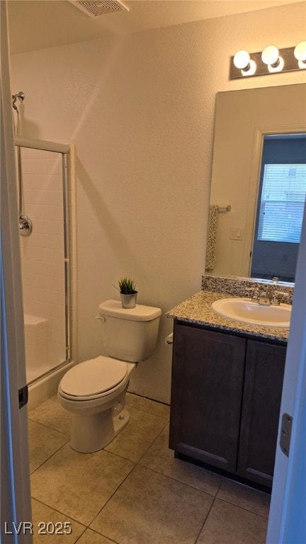 5209 Silica Chalk Ave, Las Vegas, NV 89115 - full bath with vanity, a stall shower, and tile patterned floors