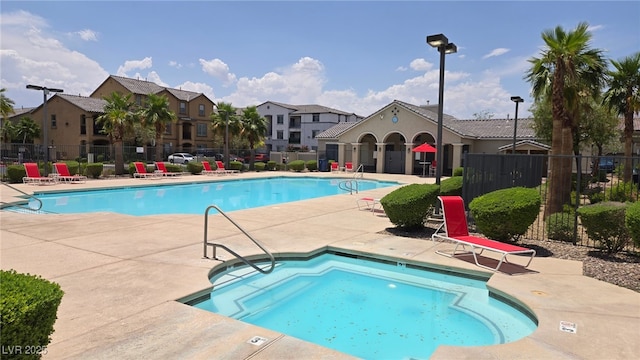 5209 Silica Chalk Ave, Las Vegas, NV 89115 - community pool with a patio area, a residential view, and a community hot tub