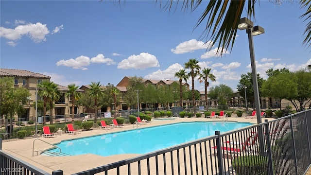 5209 Silica Chalk Ave, Las Vegas, NV 89115 - community pool featuring a patio
