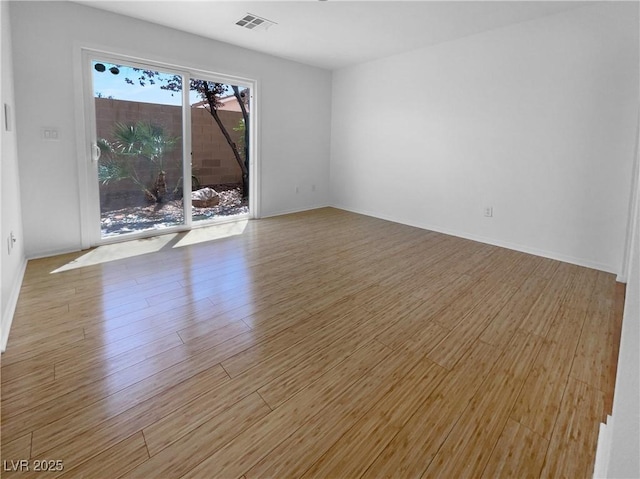 9384 Hosner St, Las Vegas, NV 89178 - empty room with light wood finished floors and baseboards