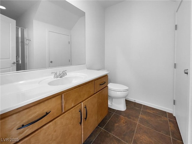 9384 Hosner St, Las Vegas, NV 89178 - full bath with vanity, toilet, baseboards, and a shower with shower door