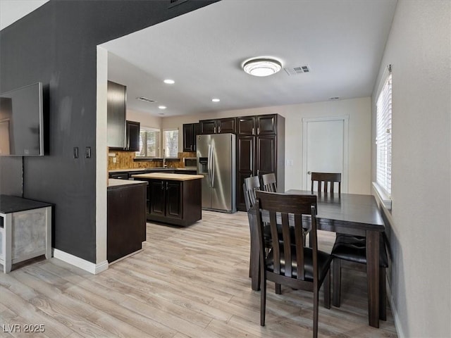 6436 Vinecrest Ave, Las Vegas, NV 89108 - dining area featuring light wood-type flooring and recessed lighting