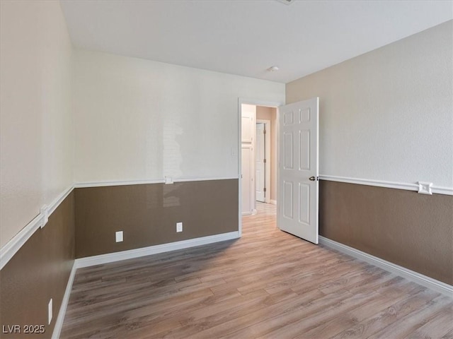 6436 Vinecrest Ave, Las Vegas, NV 89108 - unfurnished room with wood finished floors and baseboards