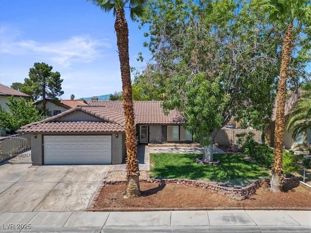 6436 Vinecrest Ave, Las Vegas, NV 89108 - view of front of house featuring a tiled roof, a garage, concrete driveway, a front lawn, and stucco siding