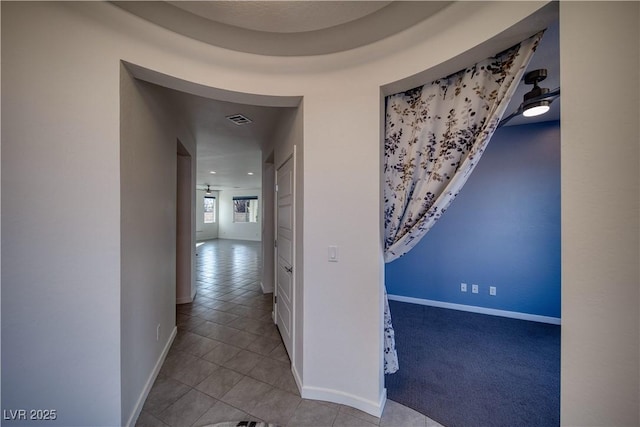 5091 E Beacon Ridge Dr, Pahrump, NV 89061 - hall with tile patterned floors and baseboards