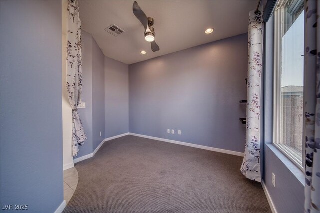 5091 E Beacon Ridge Dr, Pahrump, NV 89061 - empty room with carpet, ceiling fan, recessed lighting, and baseboards