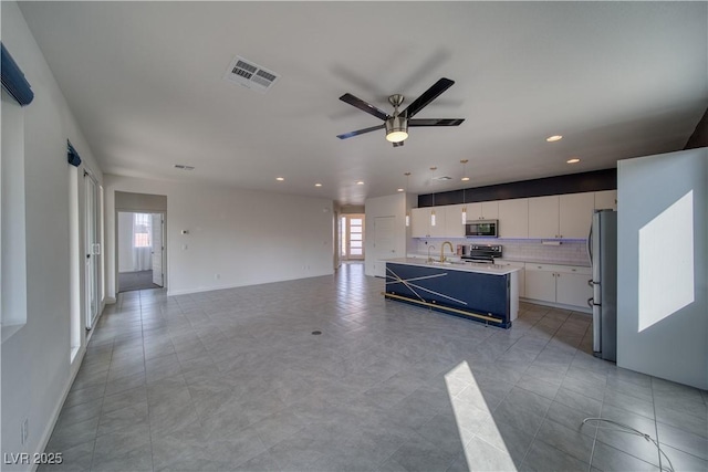 5091 E Beacon Ridge Dr, Pahrump, NV 89061 - living area with ceiling fan and recessed lighting