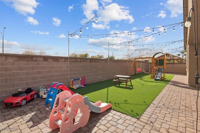 7616 Quail Dust St, North Las Vegas, NV 89084 - view of patio / terrace featuring a playground