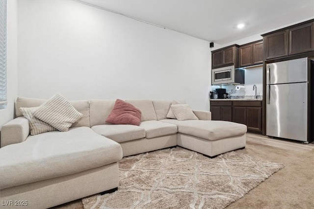 7616 Quail Dust St, North Las Vegas, NV 89084 - living area featuring light carpet and recessed lighting