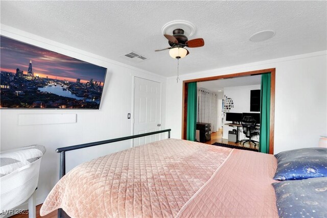 4629 Denwood Dr, Las Vegas, NV 89147 - bedroom with a textured ceiling and ceiling fan