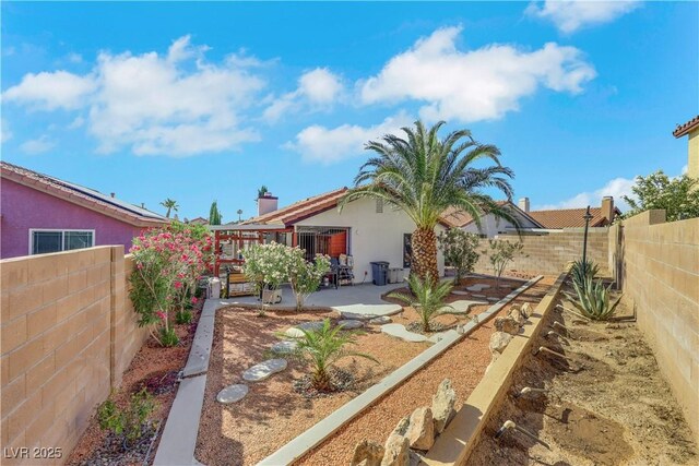 4629 Denwood Dr, Las Vegas, NV 89147 - fenced backyard with a patio area