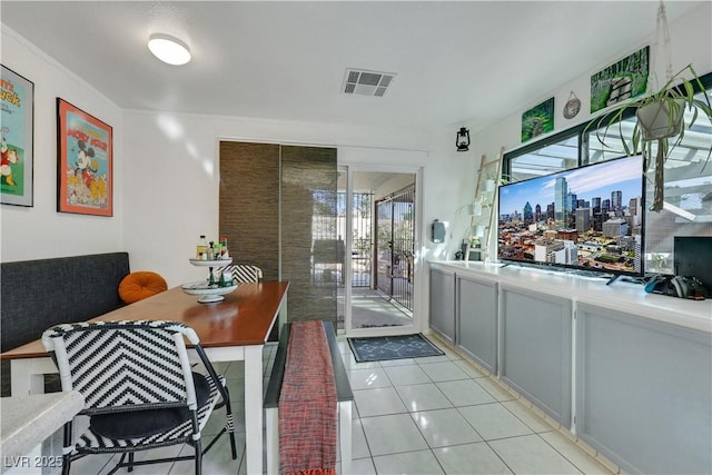 4629 Denwood Dr, Las Vegas, NV 89147 - dining room with healthy amount of natural light and light tile patterned floors