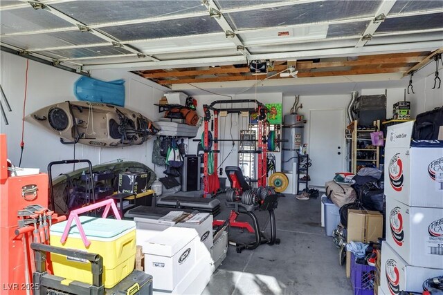 4629 Denwood Dr, Las Vegas, NV 89147 - garage with water heater and a garage door opener