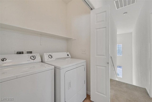 10162 Sunshine Village Pl, Las Vegas, NV 89183 - washroom with separate washer and dryer and light carpet