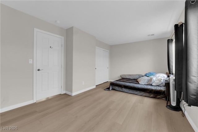 9604 Stoney Mesa Ct, Las Vegas, NV 89139 - bedroom with light wood finished floors and baseboards
