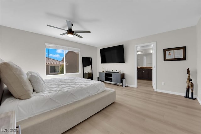9604 Stoney Mesa Ct, Las Vegas, NV 89139 - bedroom with light wood finished floors, baseboards, ceiling fan, and connected bathroom