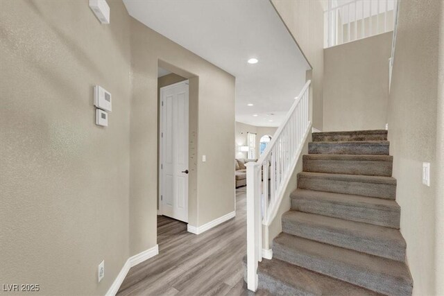 232 Delighted Ave, North Las Vegas, NV 89031 - stairway with wood finished floors, baseboards, and recessed lighting