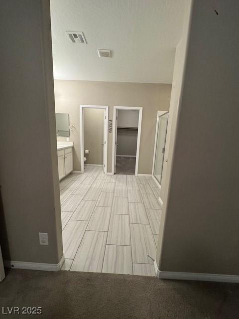 4108 Fairywren Dr, North Las Vegas, NV 89031 - hallway with baseboards