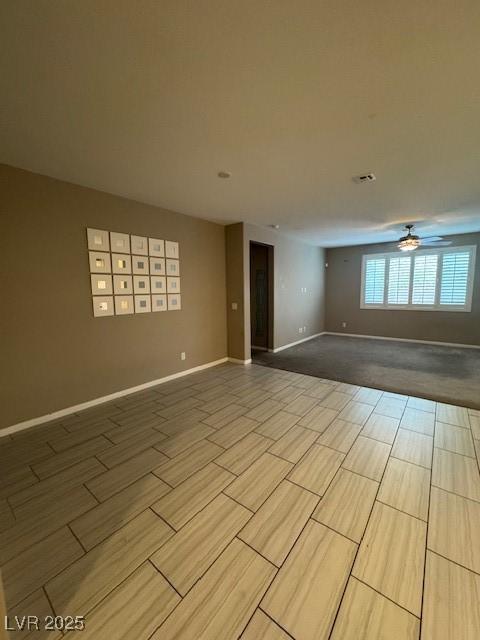 4108 Fairywren Dr, North Las Vegas, NV 89031 - empty room featuring wood finish floors, ceiling fan, and baseboards