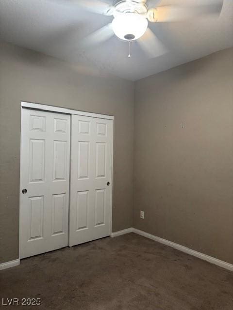 4108 Fairywren Dr, North Las Vegas, NV 89031 - unfurnished bedroom featuring carpet, a closet, baseboards, and a ceiling fan