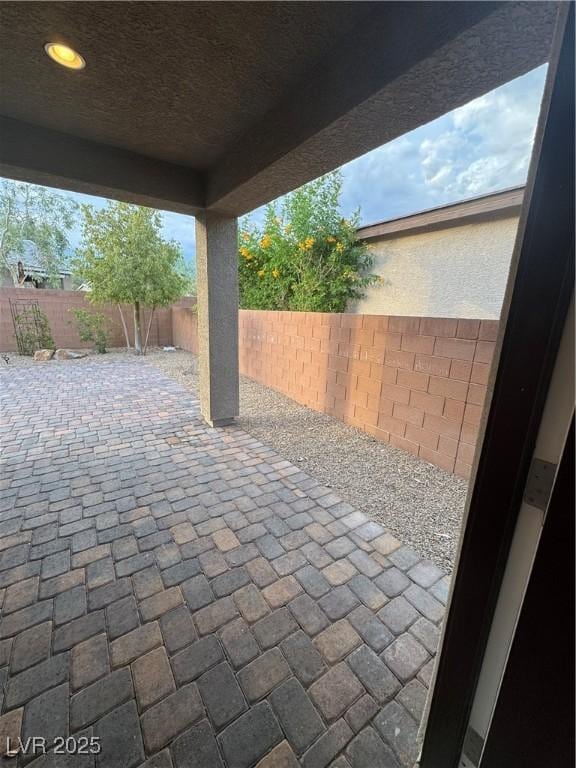4108 Fairywren Dr, North Las Vegas, NV 89031 - fenced backyard featuring a patio area