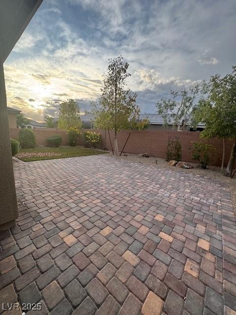 4108 Fairywren Dr, North Las Vegas, NV 89031 - fenced backyard featuring a patio