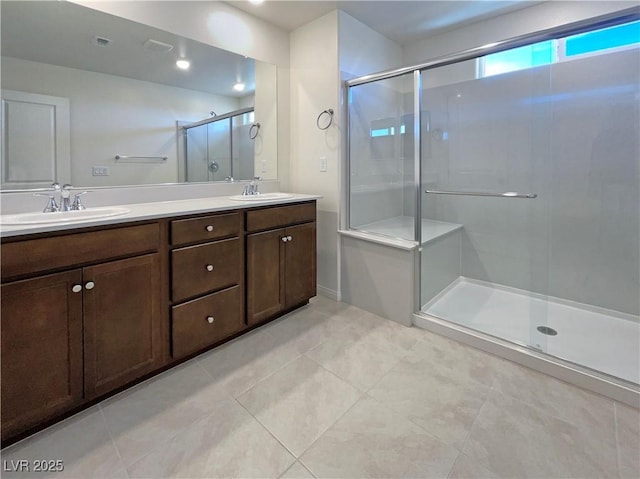 6918 Dandelion Park Ave, Las Vegas, NV 89113 - bathroom featuring double vanity, a shower stall, and tile patterned flooring